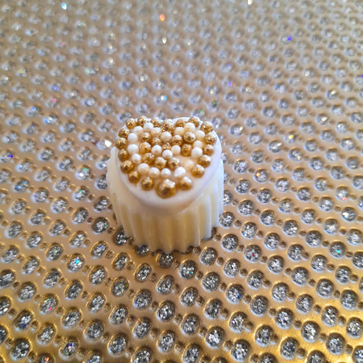 white chocolate hearts with a fondant heart with edible gold nuggets