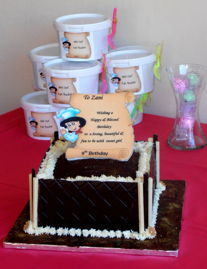 Chef Decor Party Combo with a chocolate cake and fondant designs with chef party packs